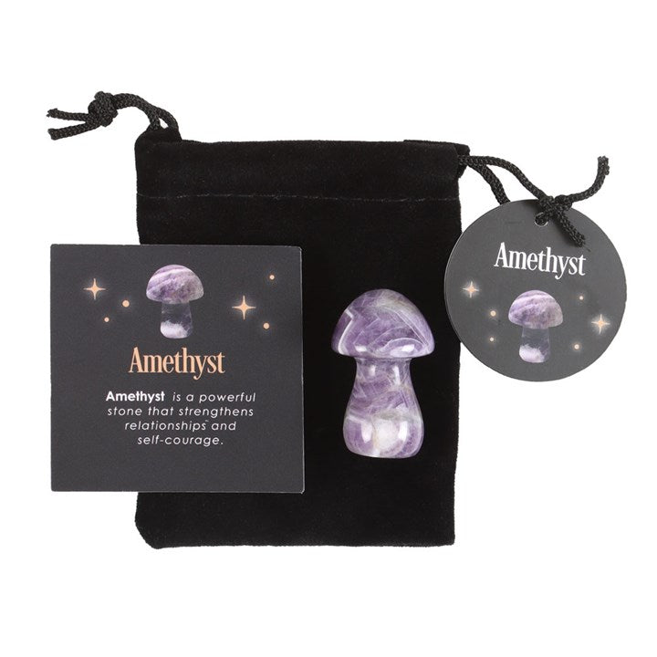 An Amethyst mushroom crystal, with a drawstring bag and a card that has 'Amethyst' text next to it.