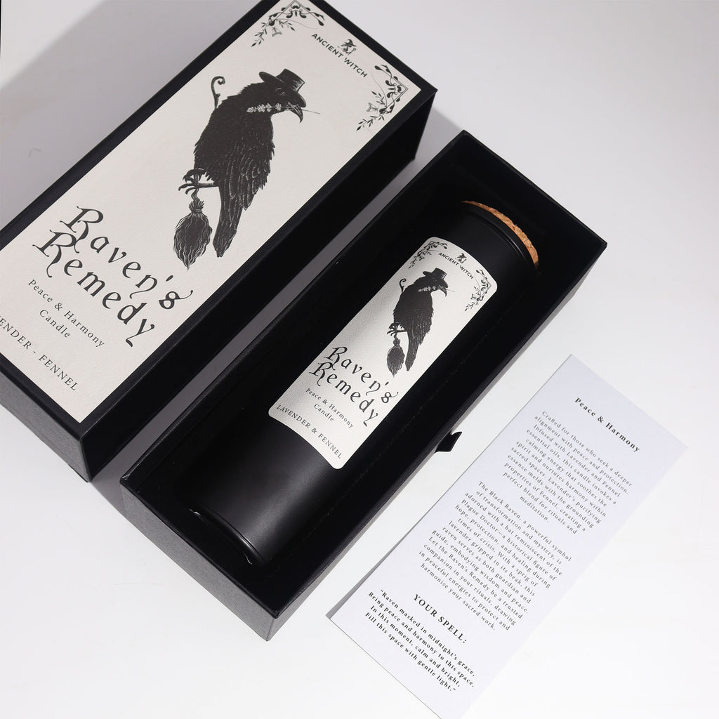 Raven's Remedy black candle on a white background