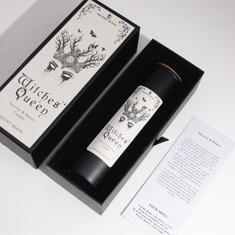 Witches' Queen black candle and box on a white background
