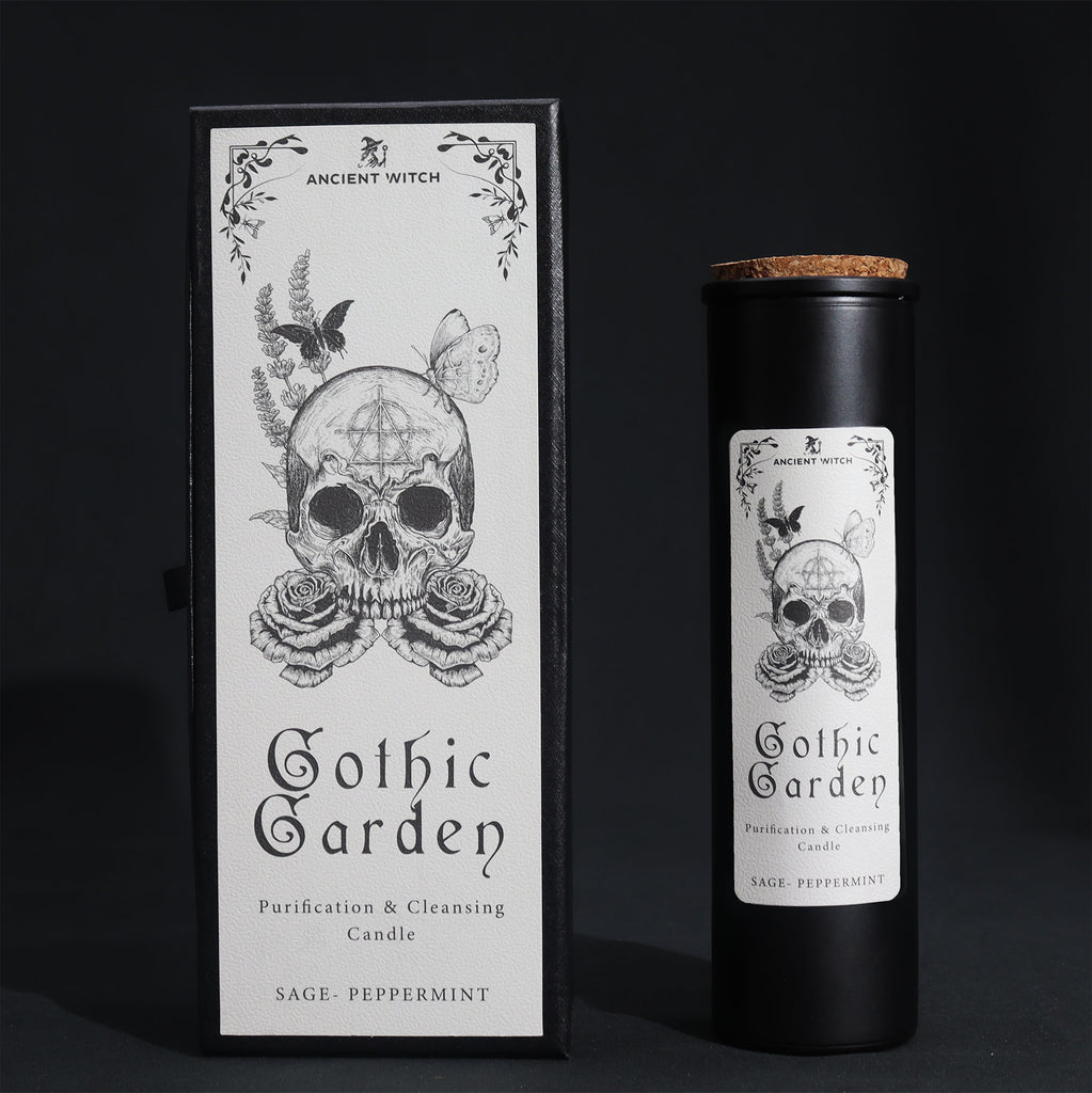 Gothic Garden candle packaging with skull and floral design on a black background