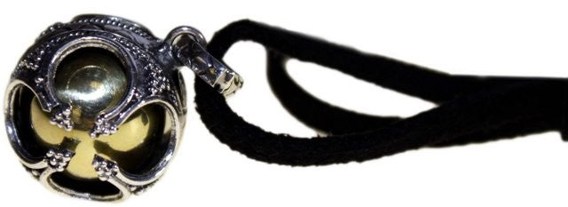 A silver angel bell necklace with a black cord, made of 92.5 silver in Bali.