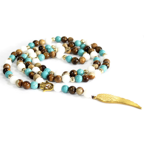 Beaded necklace with a gold Angel wing on a white background
