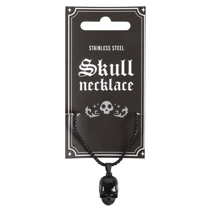 Black stainless steel skull pendant necklace displayed on a black card with the text 'SKULL NECKLACE STAINLESS STEEL' and a skull graphic.