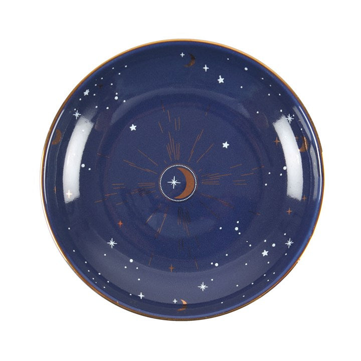 A round blue celestial moon trinket dish with silver and gold details