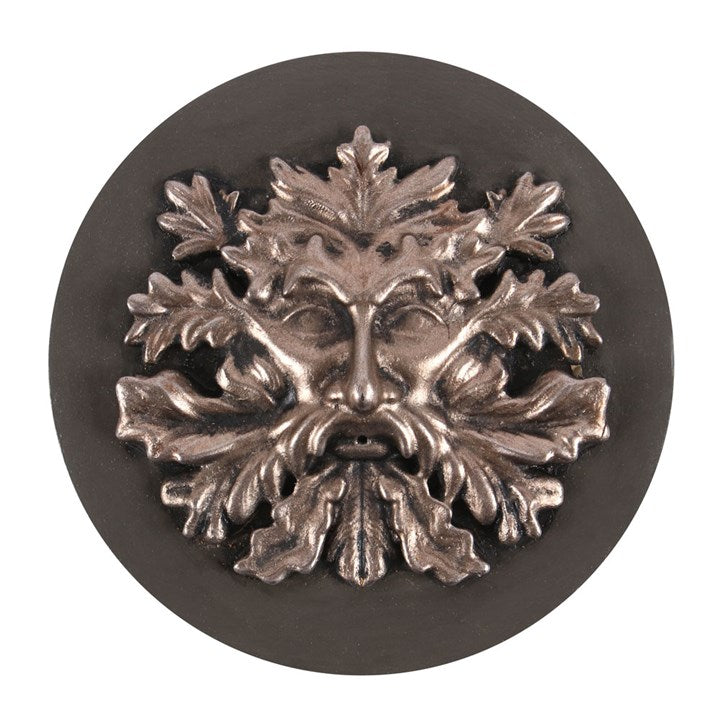 A bronze-effect green man incense holder made of resin, displayed against a white background