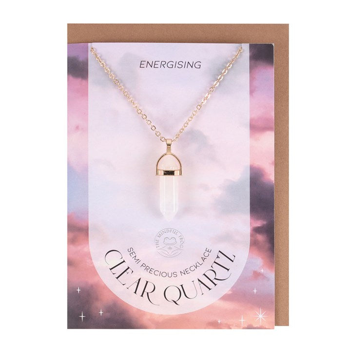 A Clear Quartz Necklace card and envelope set on a white background. 