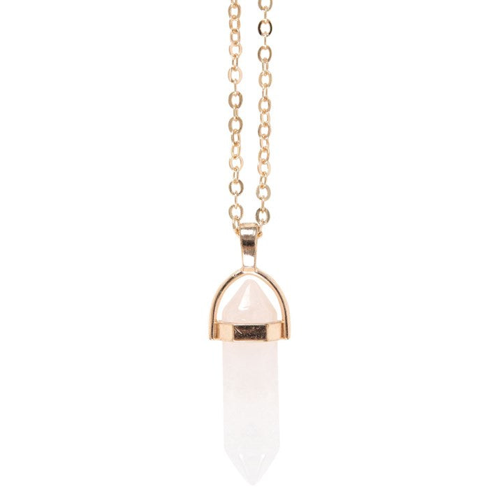 A Clear Quartz double pointed necklace with gold tones. 