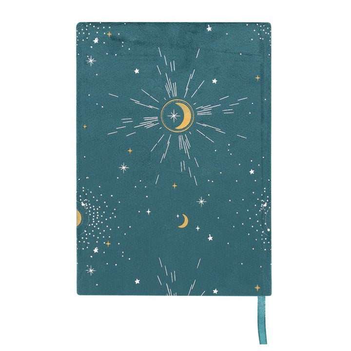 The back of a green A5 notebook with gold and silver detail