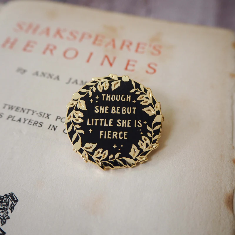 Pin with 'Though she be but little she is fierce' quote on a book titled 'Shakespeare's Heroines'.