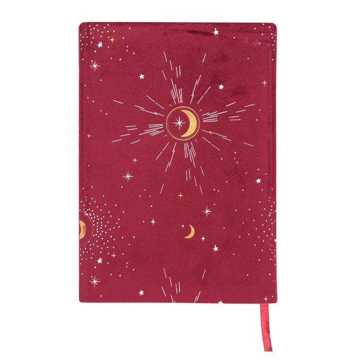 The back of a red A5 notebook with gold and silver detail