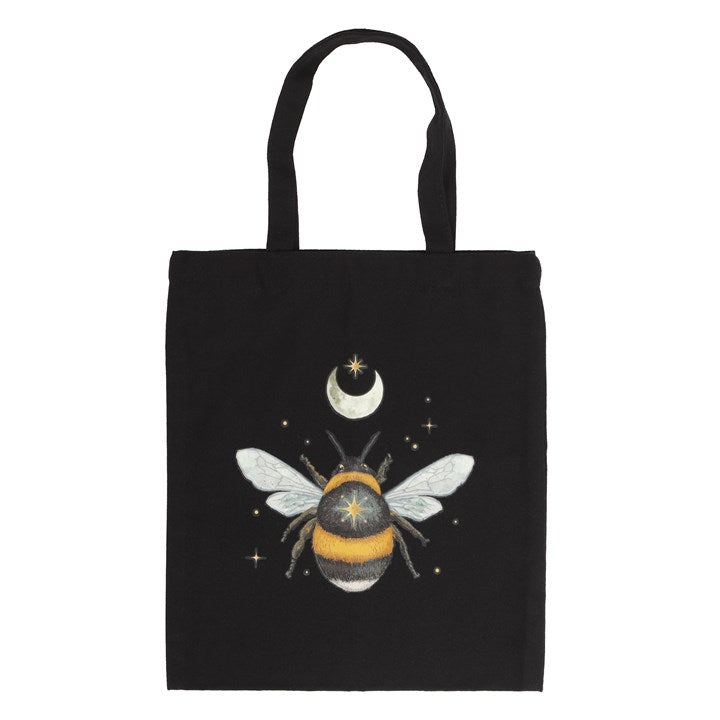 A black cotton tote bag with a forest bee print, displayed against a white background. 