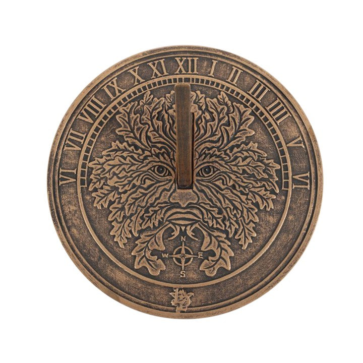 A green man themed sun dial against a white background