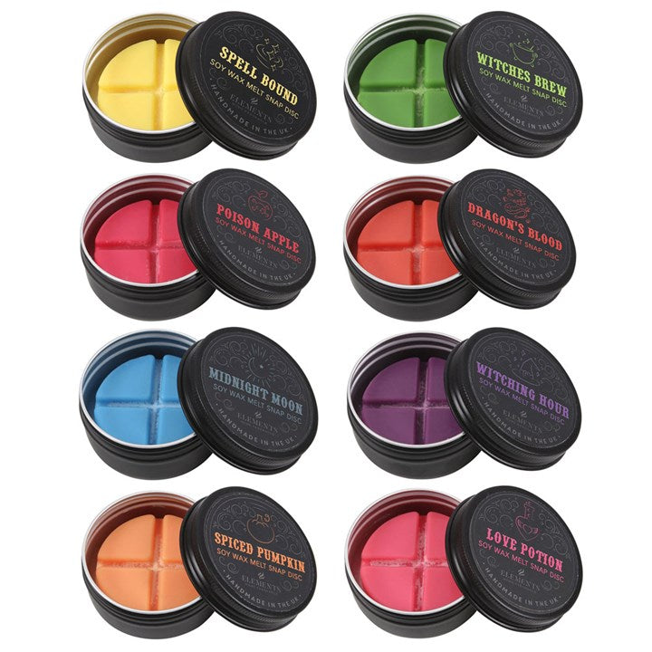 A collection of gothic-themed wax melt tins in various colours, labeled with different fragrance names such as Dragon's Blood, Spiced Pumpkin, Poison Apple, Midnight Moon, and others.
