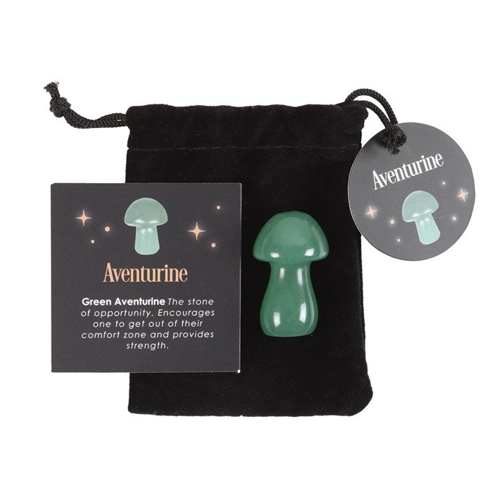 A Green Aventurine mushroom crystal, with a drawstring bag and a card that has 'Aventurine' text next to it.
