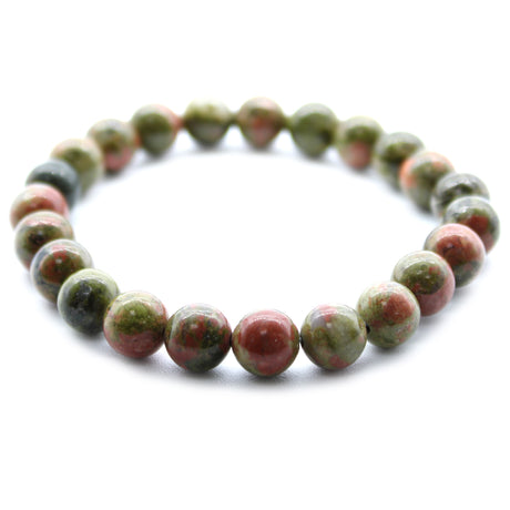 A beaded bracelet made of green and red jasper stones, displayed against a white background.