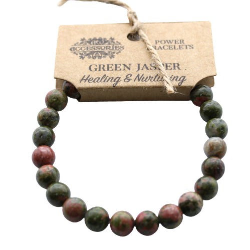 A beaded bracelet made of green and red jasper stones, displayed against a white background.