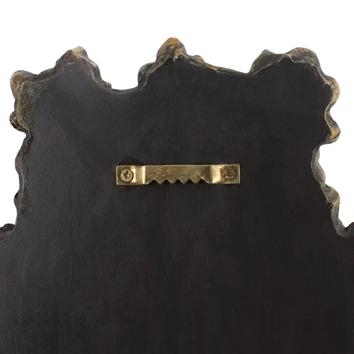 The back of a plaque showing how to hang it