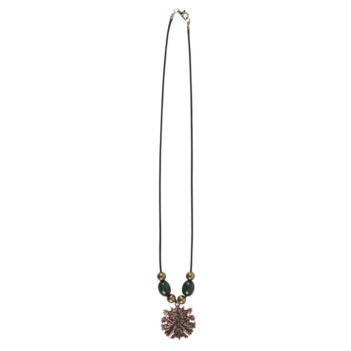 A Green Man pendant necklace with a black rope-inlaid design and a lobster clasp closure