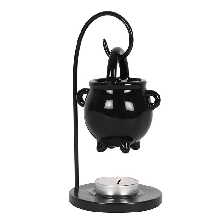 A black hanging cauldron-shaped oil burner with a lit candle below