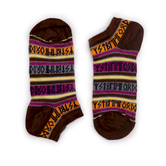 Ankle socks which are brown, with stripes of orange, pink, grey and cream with black runes, on a white surface
