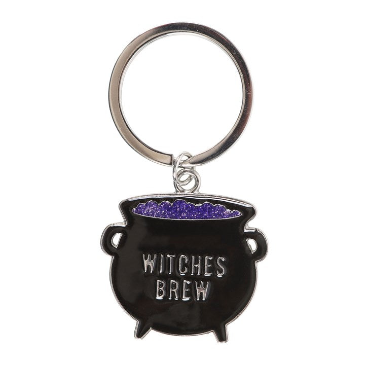 A cauldron key ring which says "Witches Brew" 