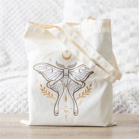 A lunar moth cotton tote bag on a white background