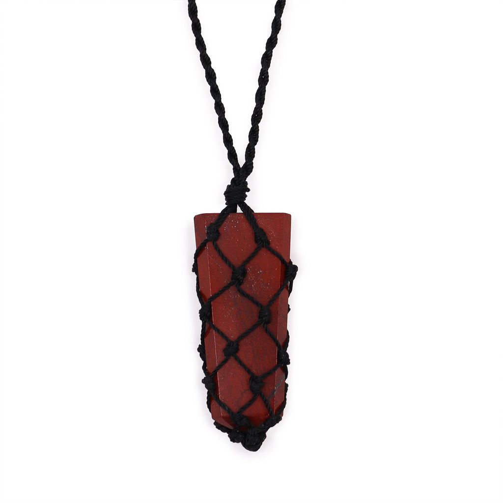 A flat point pendant with a red jasper gemstone, laced into a black necklace with an adjustable string, displayed against a white background