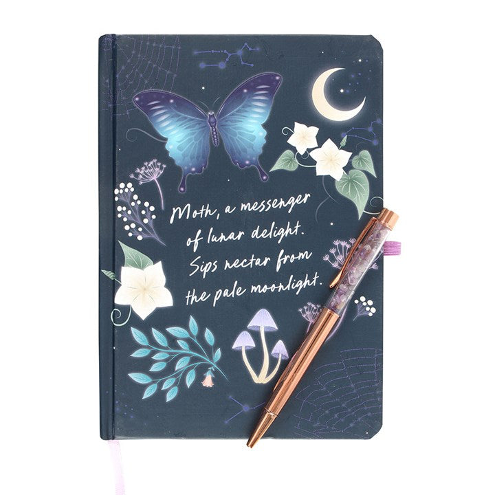 A notebook on a white surface reads "Moth, a messenger of lunar delight. Sips nectar from the pale moonlight." in cursive font.
