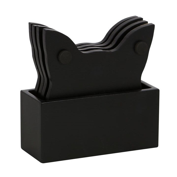 An image of black mystical cat coasters from behind.