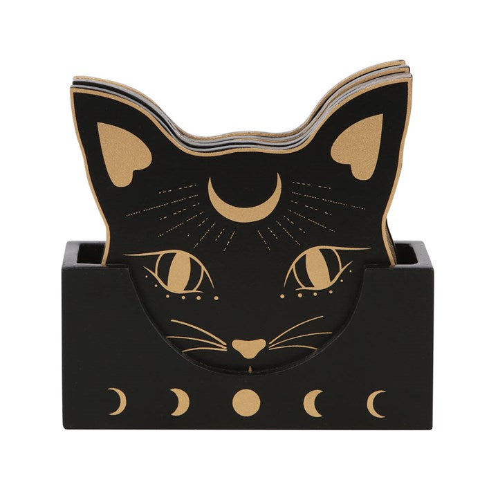 An image of black mystical cat coasters with moon phases imagery and golden accents.
