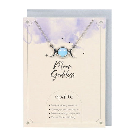 A silver-tone triple moon necklace with an Opalite stone centerpiece, presented on a card with 'Moon Goddess' written at the top.