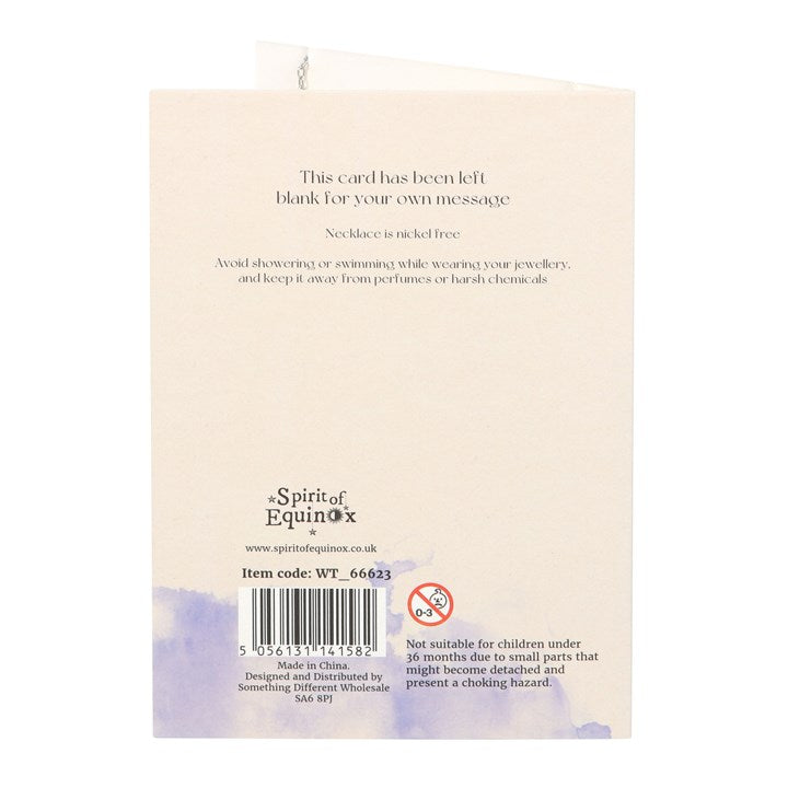 The back of a white card which is just barcodes and safety information 