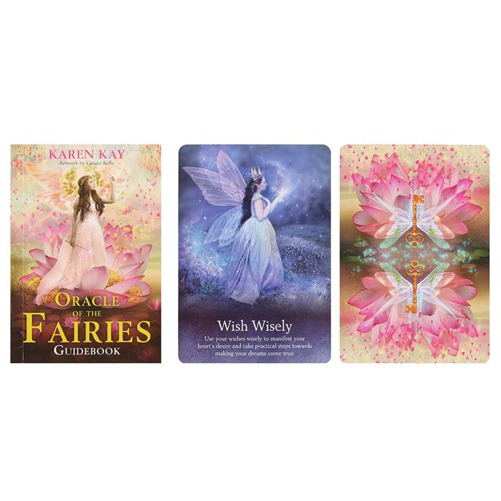 The guidebook for Oracle of the Fairies Oracle Card Deck by Karen Kay with a depiction of a fairy on the cover, set against a pastel-coloured background featuring flowers, next to two oracle cards. One has blue and purple tones with a fairy dressed in white with dark hair and a crown states "Wish Wisely" next to one depicting two golden keys and pink lotus looking flowers.