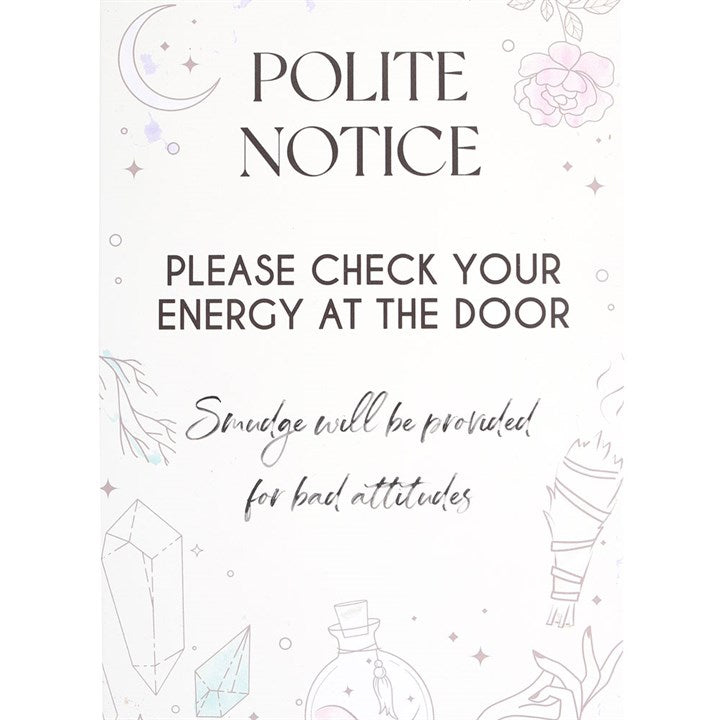 A tin sign with an illustration of crystals, potion bottles, and smudge sticks, accompanied by the phrase 'POLITE NOTICE PLEASE CHECK YOUR ENERGY AT THE DOOR. SMOUDGE WILL BE PROVIDED FOR BAD ATTITUDES. 