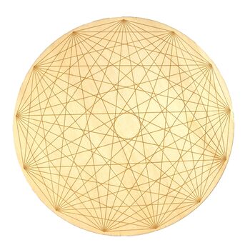 A wooden crystal grid with sacred geometric pattern