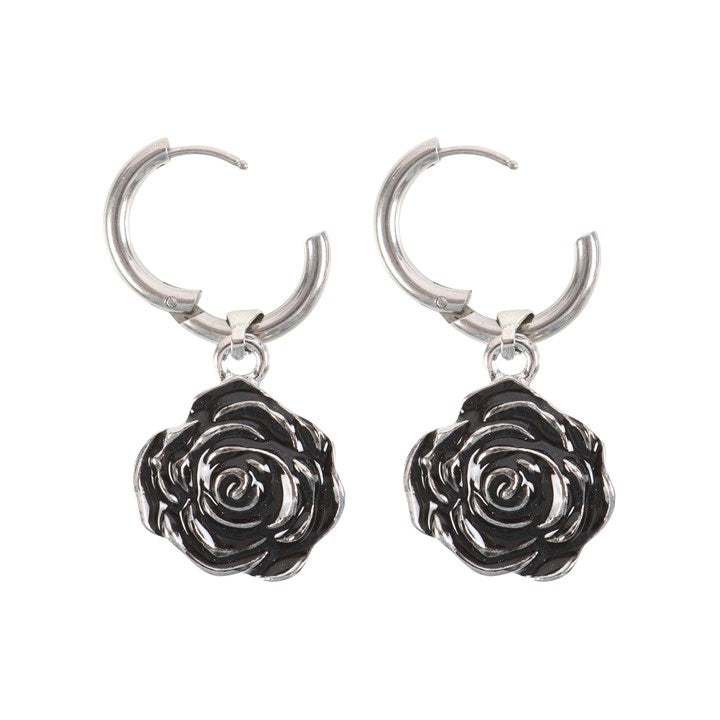 A pair of silver stainless steel rose earrings on a white background 
