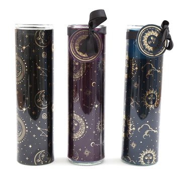 Three tube candles with gold foil accents and black ribbons. Each tube is decorated with a different celestial motif: a sun, moon, and stars configuration.
