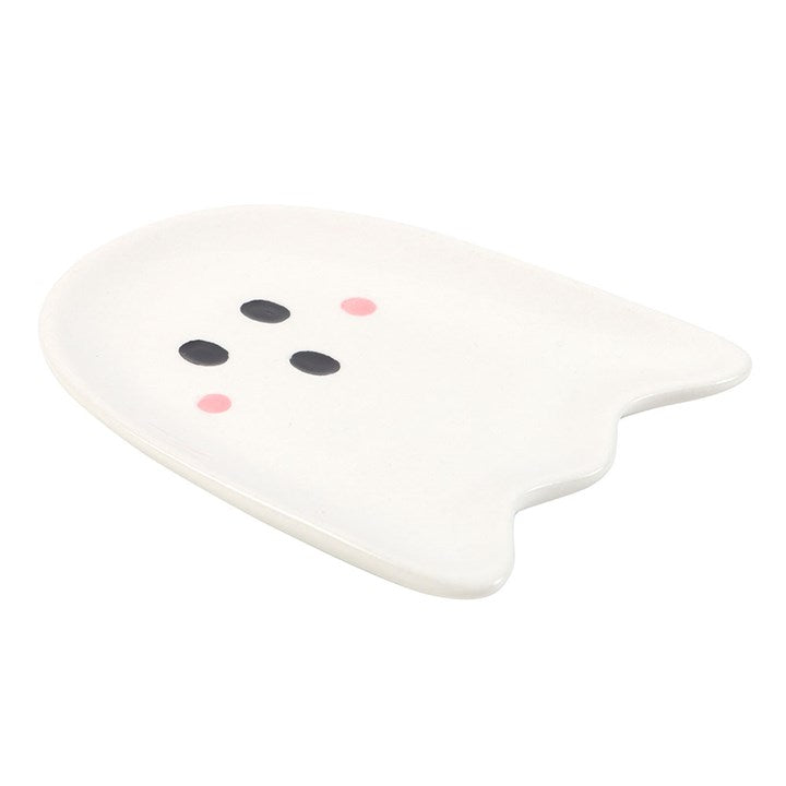 White ghost-shaped trinket dish with black and pink accents on a white background