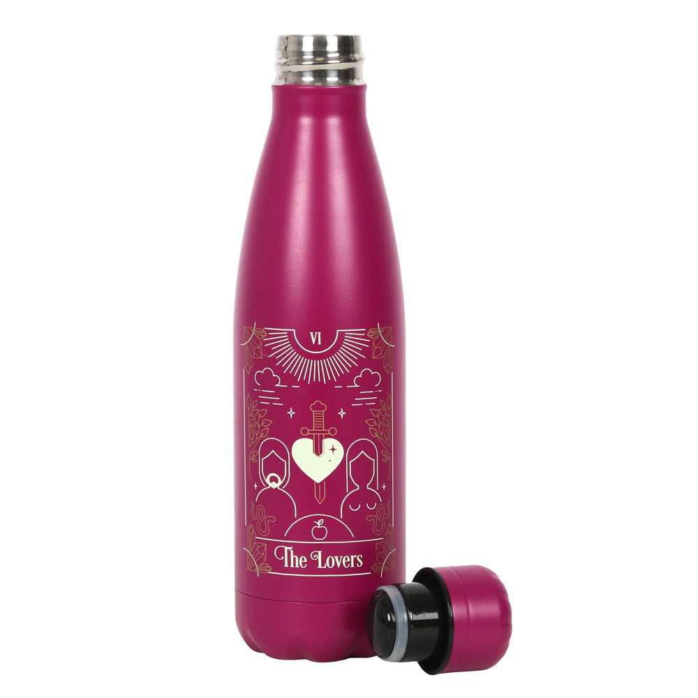 A pink metal water bottles featuring a lovers tarot card illustration with the lid off