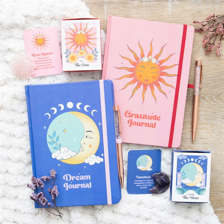 A Celestial Dreams bundle including sun and moon themed notebooks and keepsake matchbox crystals