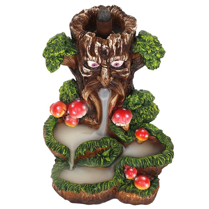 A colourful backflow incense burner featuring the Tree Man design with toadstools around it. The burner is made of resin.