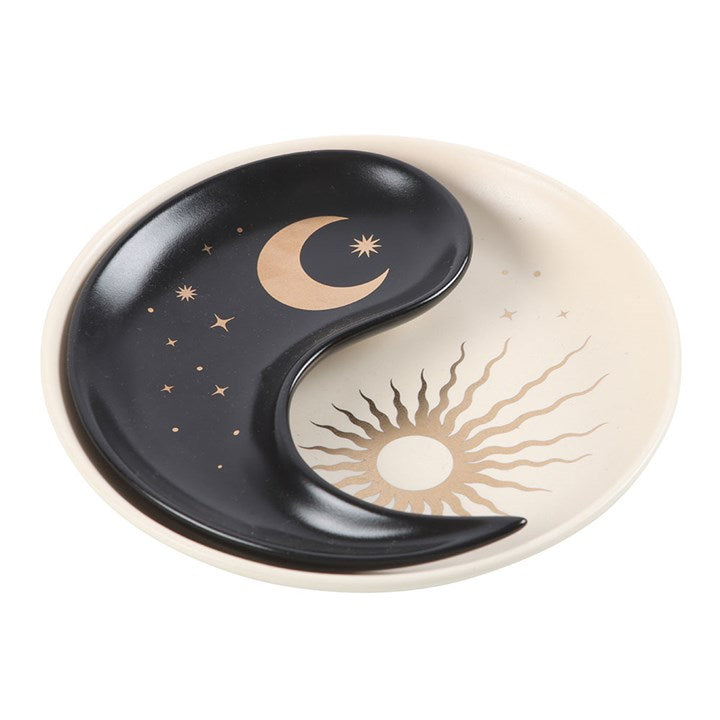 Two ceramic trinket dishes with a stacked yin yang and sun/moon design, displayed against a white background