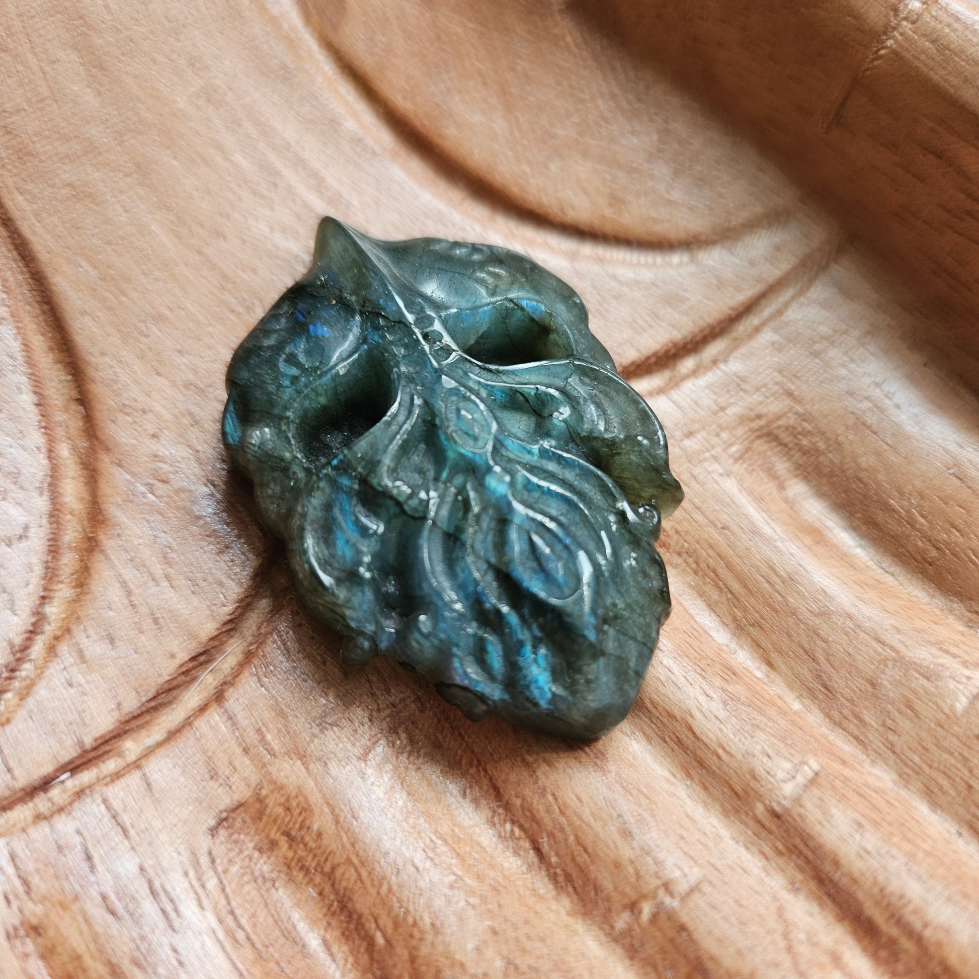 Close up of a labradorite viking carving.